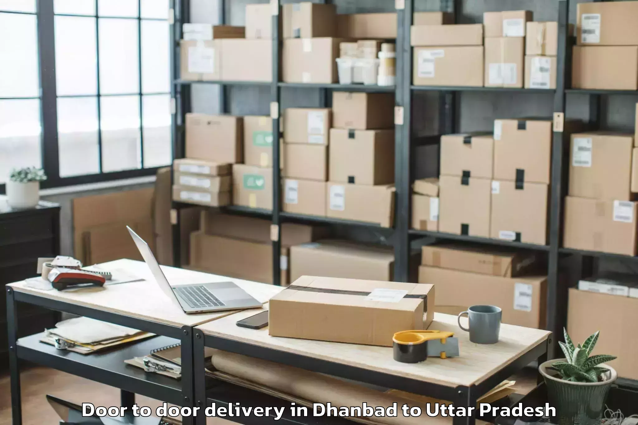 Dhanbad to Ghanghata Door To Door Delivery Booking